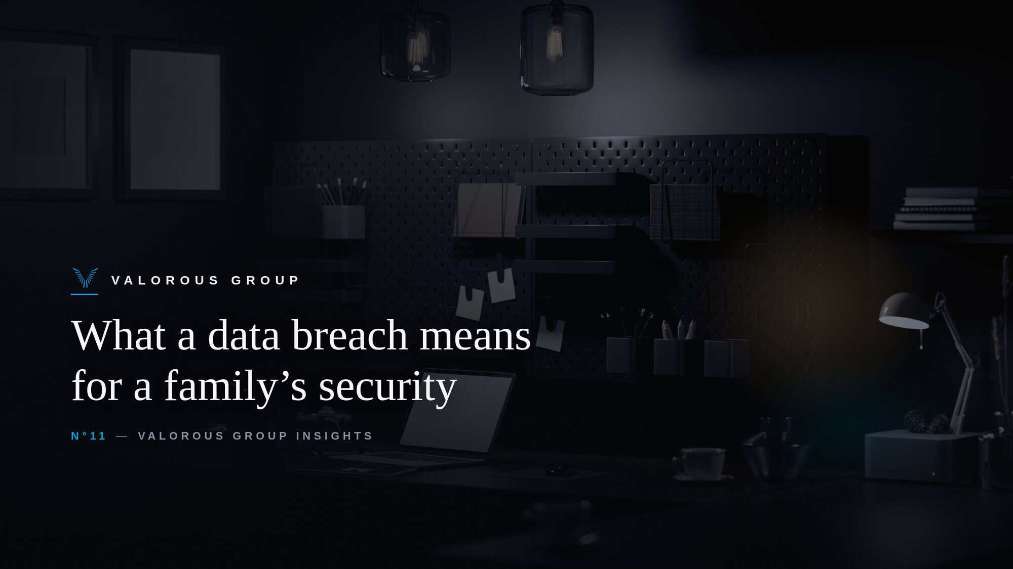 Valorous Group insights, data breach and family security, night office with a single desk lamp