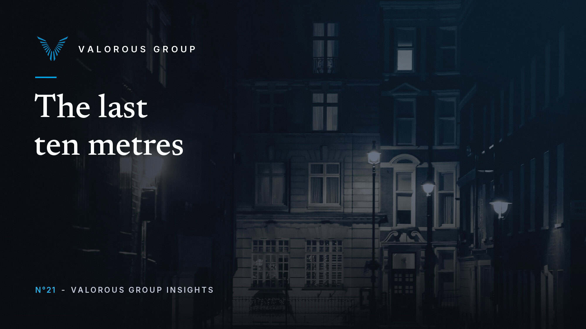 A quiet Westminster street at night, lamplit townhouse frontages and an empty pavement